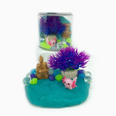 This play kit is a lotl fun! Create your own Axolotl aquarium with fantastically scented KidDough and a-dough-rable play pieces. Blue Hawaiian scented! Our sensory play kits are designed to inspire imagination and promote open ended sensory play.